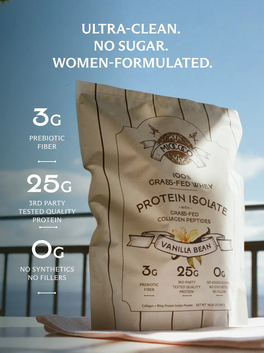 Protein powder package with branding and nutritional information on a blurred outdoor background