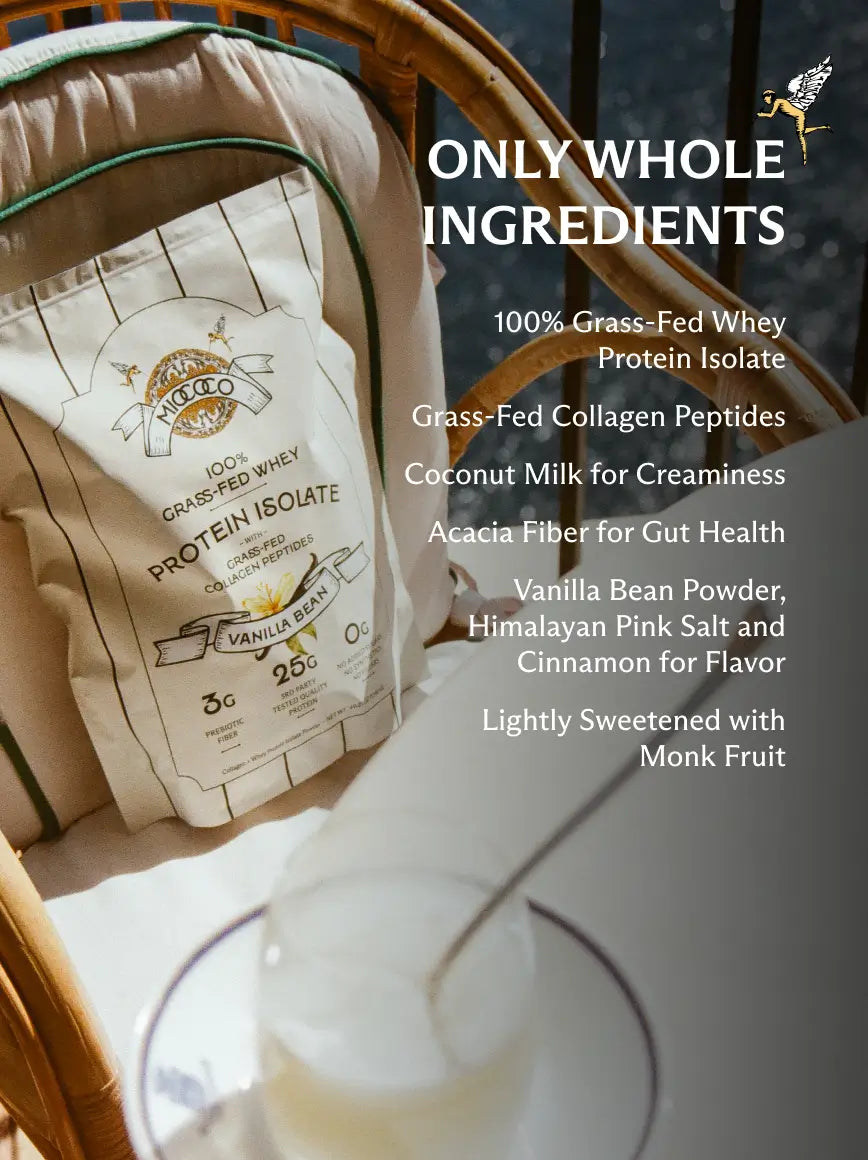 Protein powder package with a glass of protein shake on a wooden table, featuring text about whole ingredients.